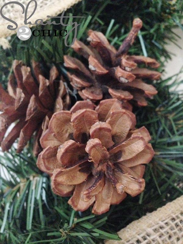 hot-glue-pinecones-to-wreath