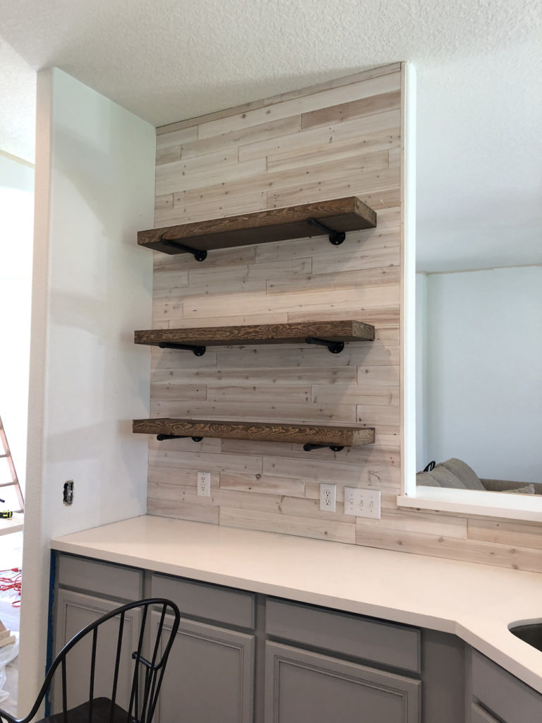 DIY Floating Shelves with Pipe - Shanty 2 Chic