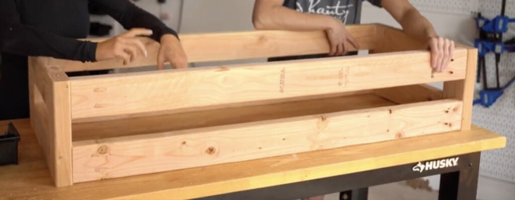 Completed rectangular bench frame built with 2x4s for the cowhide bench project.